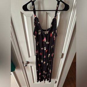 Black billabong dress with flowers. Never worn.